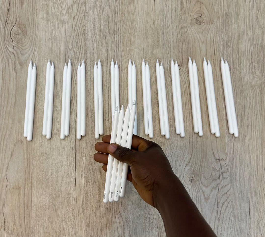 Apple Pencils held in hand